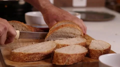 Man slicing a italian bread Stock Footage 153765996