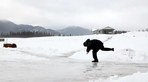 Man slipping on ice Stock Footage