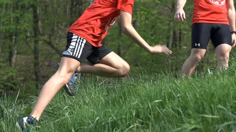 Man slipping while running uphill Stock Footage 39470849