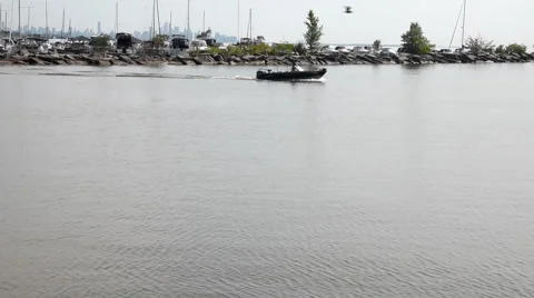 Man in small Boat Stock Footage 40575618