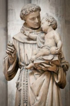 Man with small boy statue. Stock Photos