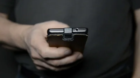 Man with smartphone Stock Footage 70210390