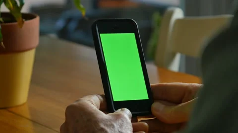 MAN WITH SMARTPHONE GREENSCREEN 4K Stock Footage 45203939