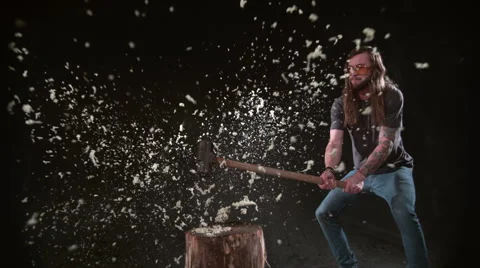 Man smashing can of silly string with hammer in slow motion, shot on Phantom Stock Footage 55674940