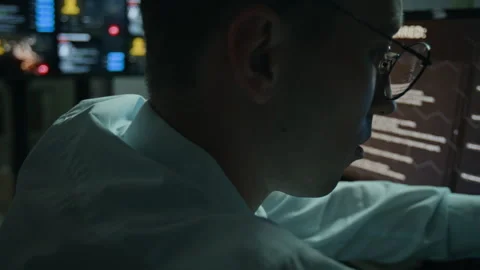 Man Smelling Stack of Dollar Bills at Computer Screen Stock Footage 346699579