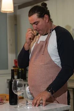 Man smelling wine cork preparing for wine tasting Stock Photos