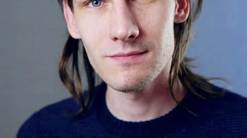 The man smiled at the camera Stock Footage 104947678