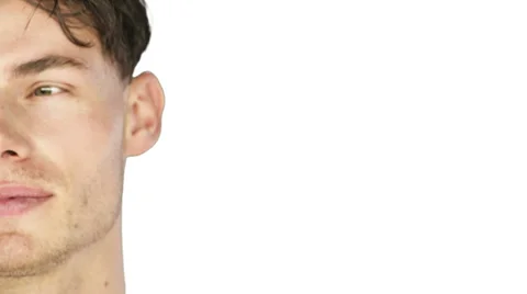 Man smiles into the camera with a white background Stock Footage 33842054