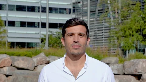 Man smiling and looking at camera, slow motion video portrait Stock Footage 96066746