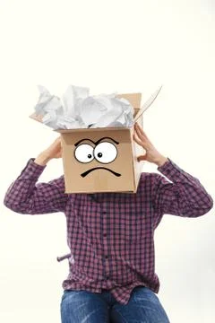 Man with smiling box over his head Stock Photos
