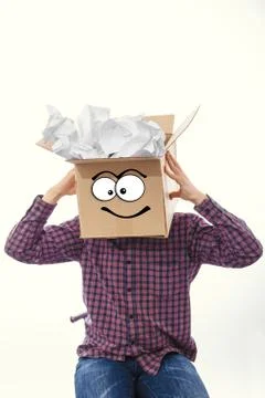 Man with smiling box over his head Stock Photos