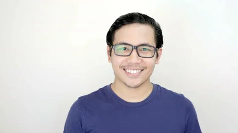 Man Smiling Close up Portrait on White Background in Studio 4K Resolution Stock Footage 59949543