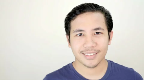 Man Smiling Close up Portrait on White Background in Studio 4K Resolution Stock Footage 59949610