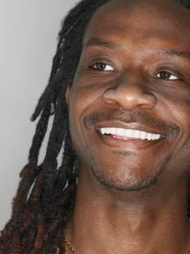 Man Smiling On Gray Background Stock Photos