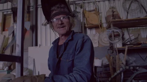 Man smiling in a workshop Stock Footage 279775516