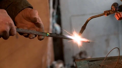 Man the Smith heats the metal Stock Footage 75159754