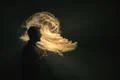 The man smoke an electric cigarette on the background of the flame Photo