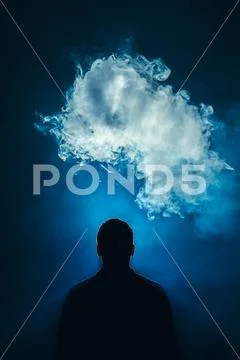 The man smoke an electric cigarette on the background of a blue light Stock Photos