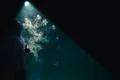 The man smoke an electric cigarette with a ring and on the background of br.. Photo