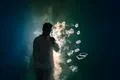 The man smoke an electric cigarette with a ring against the dark background Photo