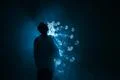 The man smoke an electric cigarette with a ring against the background of t.. Photo