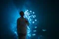 The man smoke an electric cigarette with a ring against the background of t.. Photo