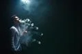 The man smoke an electrical cigarette with a ring and on the dark background Photo