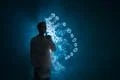 The man smoke an electronic cigarette with a ring against the background of.. Photo