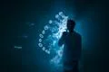 The man smoke an electronic cigarette with a ring against the background of.. Photo