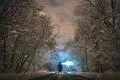 The man smoke on the forest road. evening night time Photo
