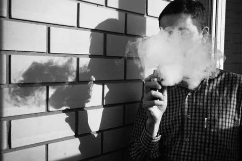The man in smoke Stock Photos