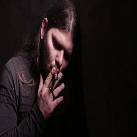 Man smokes cigar. 4K UHD Stock Footage