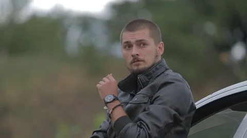 Man smokes a cigarette in a depression Stock-Footage 71604726