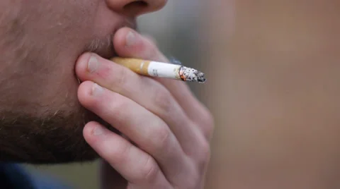 Man Smokes Cigarette Stock Footage 37037780
