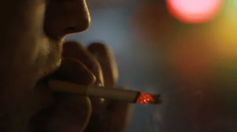 Man smokes a cigarette Stock Footage 61724477