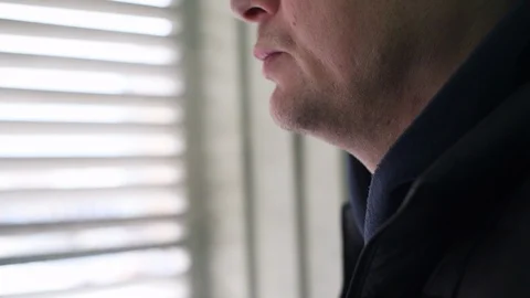 A man smokes a cigarette Stock Footage 122103756