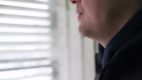 A man smokes a cigarette Stock Footage 122107116