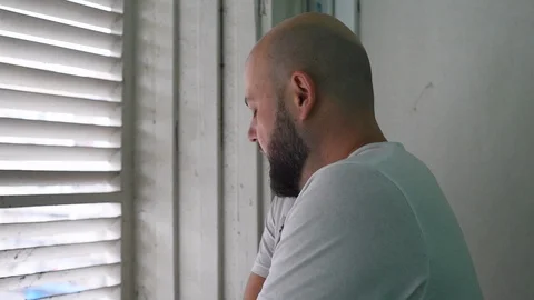 A man smokes a cigarette Stock Footage 122109697