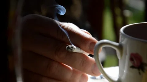 Man smokes a cigarette Stock Footage 314584583