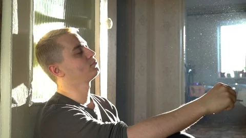 Man smokes a cigarette.Slow motion Stock-Footage 86185385
