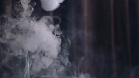 A man smokes a hookah and blows smoke rings 库存影片 200204246