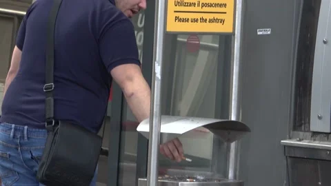 Man Smokes Next To Train Inside The FCO Fiumicino Airport In Rome, Italy Stock Footage 154969324