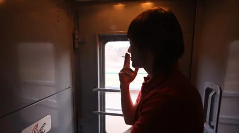 Man smokes a train Stock Footage 4537449