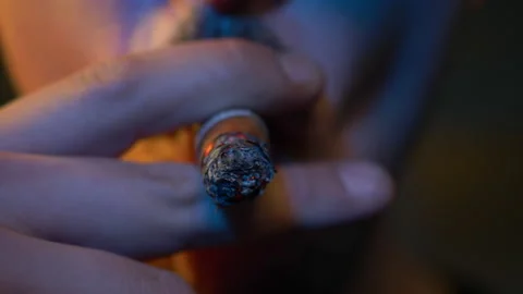 A man smoking a cigar Stock Footage 200859885