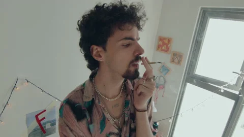 Man Smoking Cigarette and Dancing in Bedroom Stock Footage 235659886