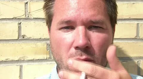 Man Smoking Cigarette - Close Up Stock Footage 12598647