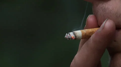 Man Smoking Cigarette Stock Footage 27845565