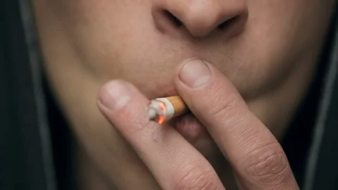 Man smoking a cigarette Video stock 82444451