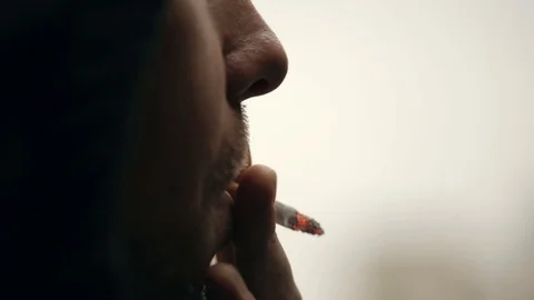 Man smoking a cigarette Video stock 82444596