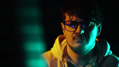 Man Smoking Cigarette in Front of Glitching Computer Screen in Dark Room, Close Stock Footage 301319971